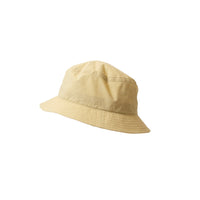 Mature Ha Bucket Hat in Washed Muted Yellow Ripstop