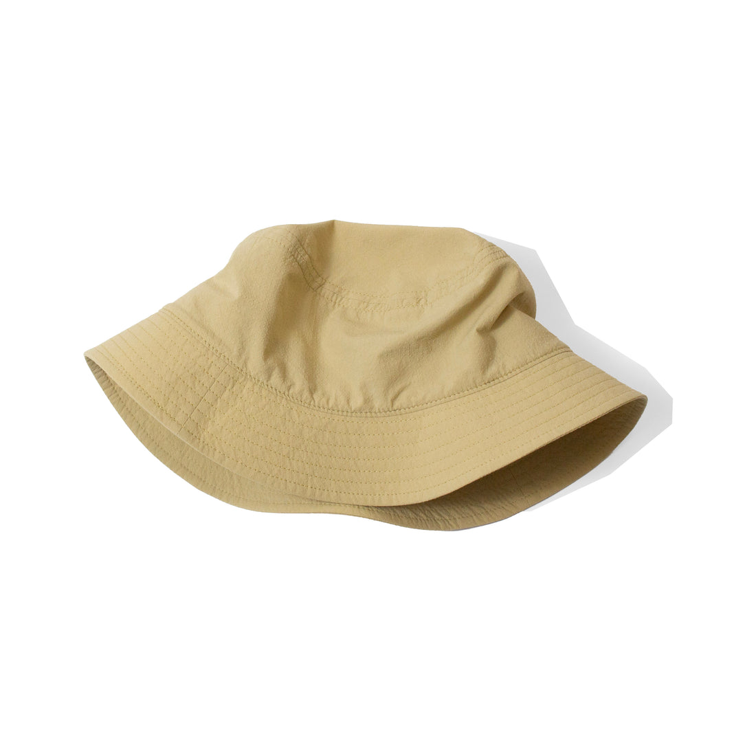 Mature Ha Bucket Hat in Washed Muted Yellow Ripstop